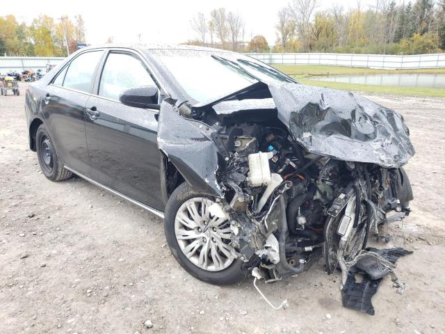 TOYOTA CAMRY HYBR 2014 with VIN 4T1BD1FK9EU136019 - Photo from auction