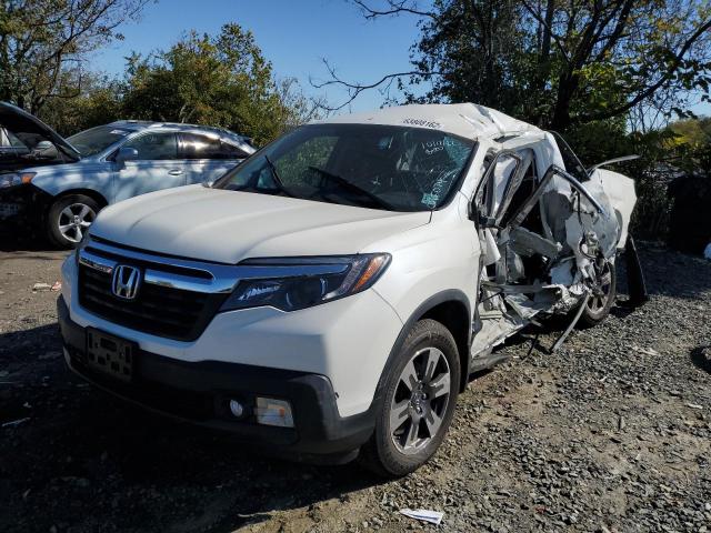 Photo 2 from auction – 2018 HONDA RIDGELINE with VIN 5FPYK3F68JB015074