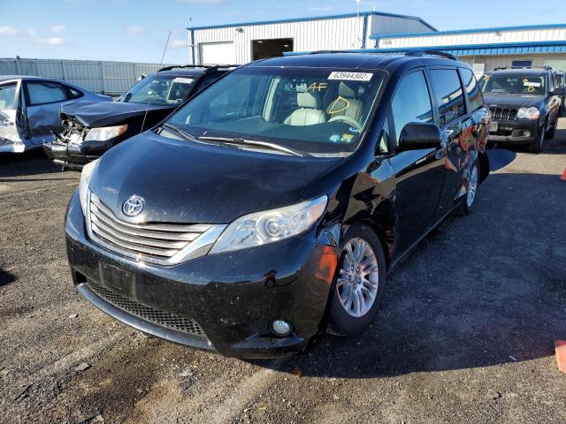 Photo 2 from auction – 2014 TOYOTA SIENNA XLE with VIN 5TDYK3DC7ES468783
