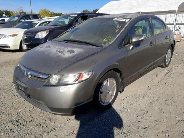 Photo 2 from auction – 2006 HONDA CIVIC HYBR with VIN JHMFA36256S026512