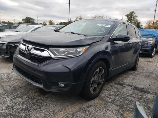 Photo 2 from auction – 2018 HONDA CR-V EX with VIN 7FARW2H54JE070352
