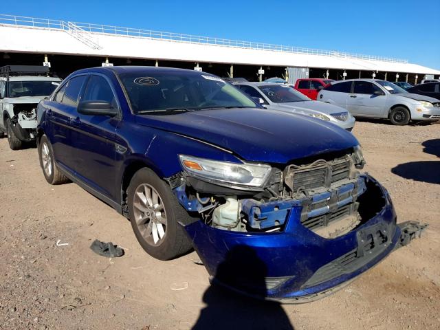 FORD TAURUS SE 2014 with VIN 1FAHP2D97EG129991 - Photo from auction