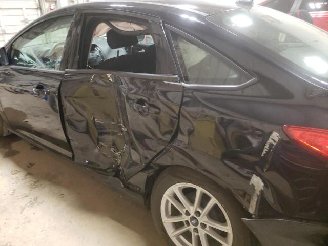Photo 9 from auction – 2016 FORD FOCUS SE with VIN 1FADP3F2XGL398730