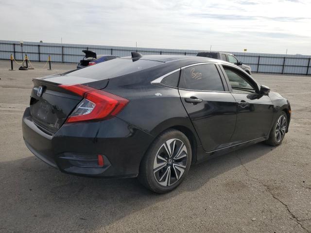 Photo 4 from auction – 2016 HONDA CIVIC EX with VIN 2HGFC1F35GH635957