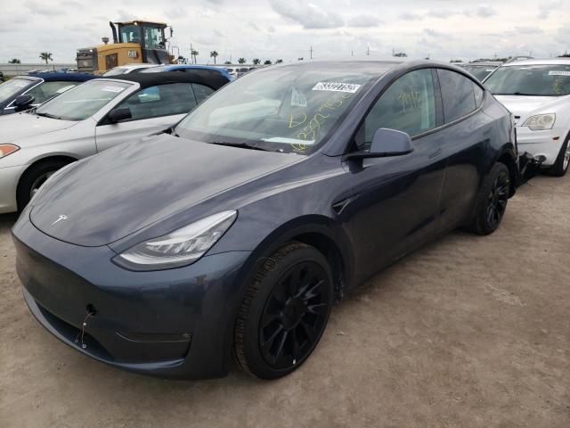 TESLA MODEL Y 2022 with VIN 7SAYGDEE5NF386694 - Photo from auction