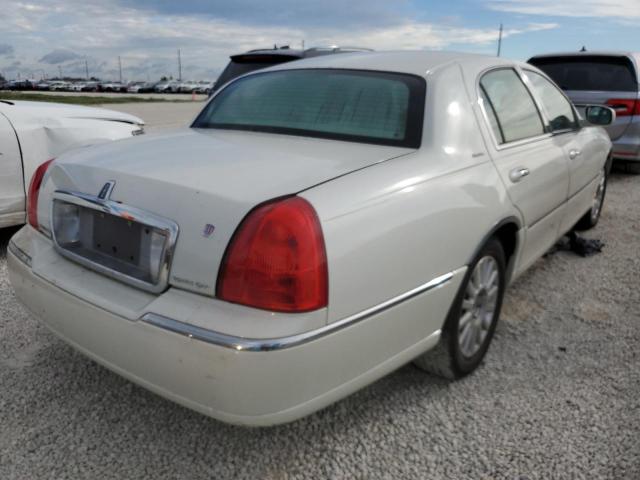 Photo 4 from auction – 2003 LINCOLN TOWN CAR E with VIN 1LNHM81W33Y703795