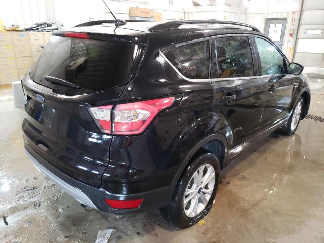 Photo 4 from auction – 2018 FORD ESCAPE SE with VIN 1FMCU9GD5JUD27532