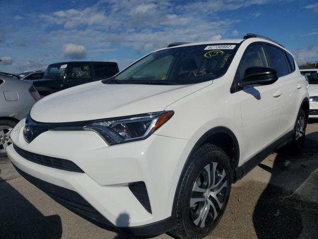 Photo 2 from auction – 2018 TOYOTA RAV4 LE with VIN JTMZFREV0JD111480