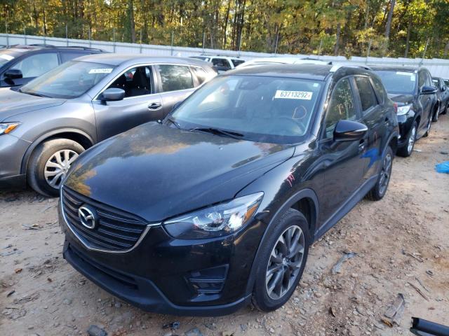 Photo 2 from auction – 2016 MAZDA CX-5 GT with VIN JM3KE2DY3G0664493