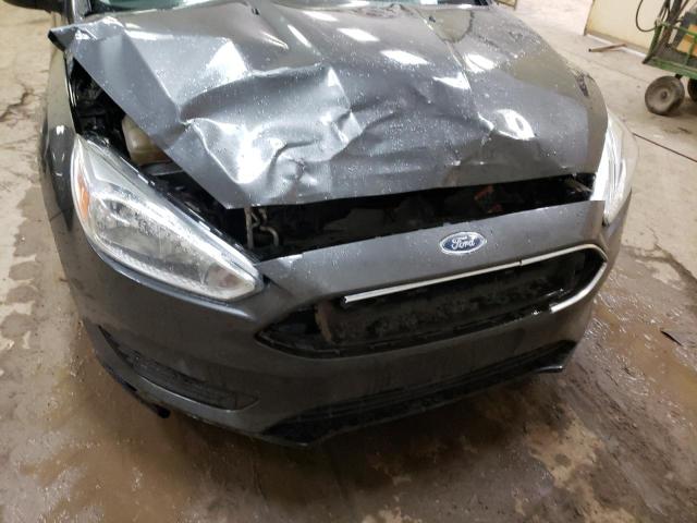 Photo 9 from auction – 2015 FORD FOCUS SE with VIN 1FADP3K29FL351497
