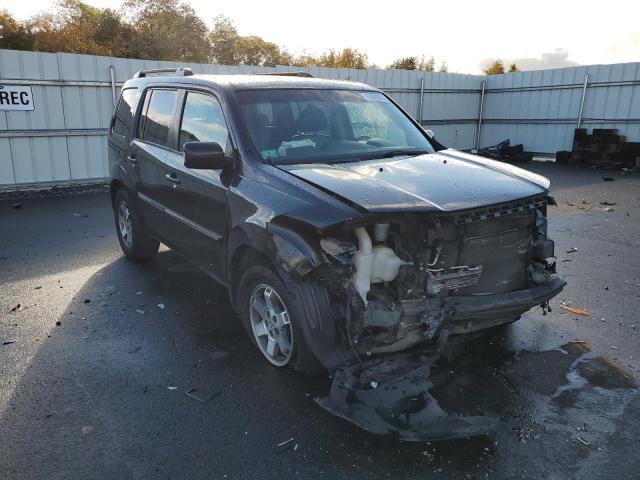 Photo 9 from auction – 2011 HONDA PILOT TOUR with VIN 5FNYF4H9XBB039324