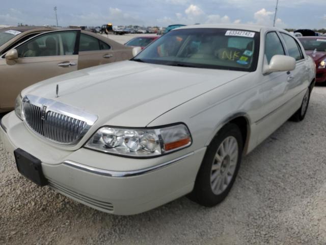 Photo 2 from auction – 2003 LINCOLN TOWN CAR E with VIN 1LNHM81W33Y703795
