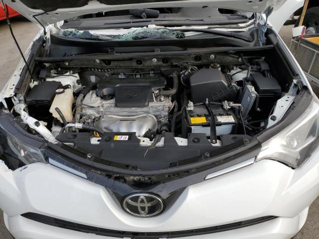 Photo 7 from auction – 2018 TOYOTA RAV4 LE with VIN JTMZFREV3JJ743780