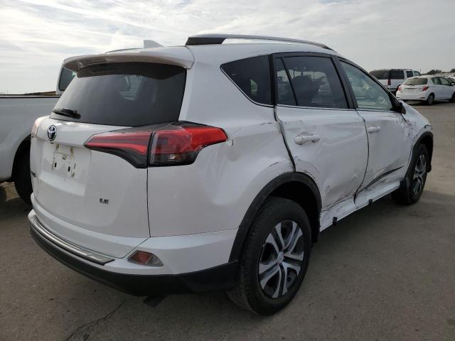 Photo 4 from auction – 2018 TOYOTA RAV4 LE with VIN JTMZFREV3JJ743780