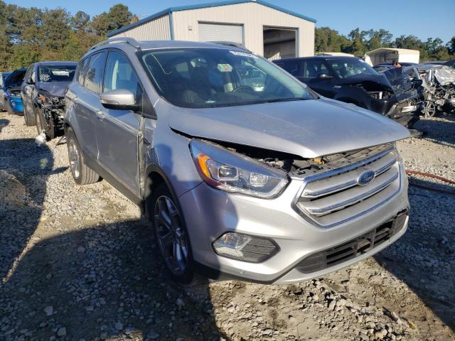FORD ESCAPE TIT 2019 with VIN 1FMCU9J96KUA77028 - Photo from auction