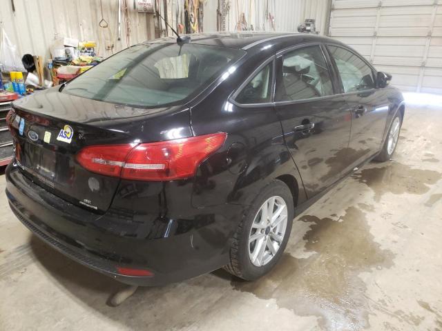 Photo 4 from auction – 2016 FORD FOCUS SE with VIN 1FADP3F2XGL398730