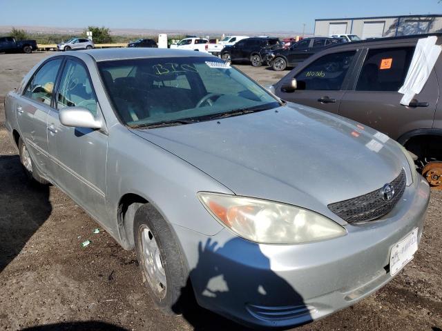 TOYOTA CAMRY LE 2003 with VIN 4T1BF32K43U567313 - Photo from auction