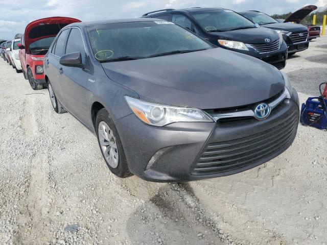 TOYOTA CAMRY HYBR 2015 with VIN 4T1BD1FK7FU148073 - Photo from auction
