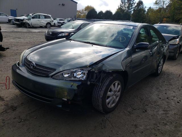 Photo 2 from auction – 2002 TOYOTA CAMRY LE with VIN 4T1BF30K32U515205
