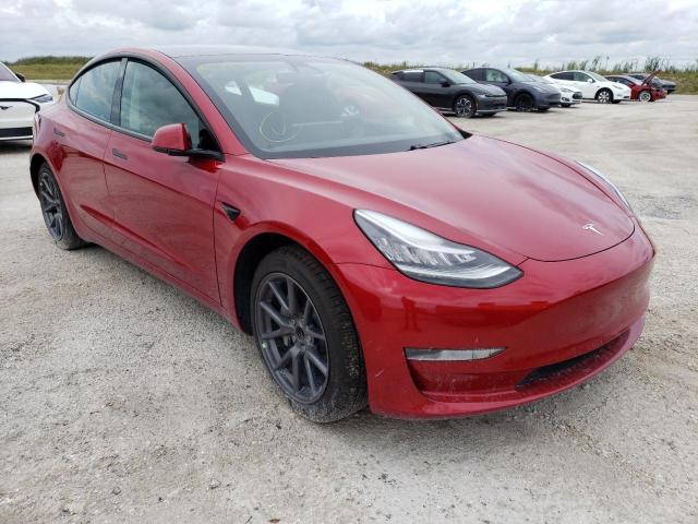 TESLA MODEL 3 2021 with VIN 5YJ3E1EAXMF859450 - Photo from auction