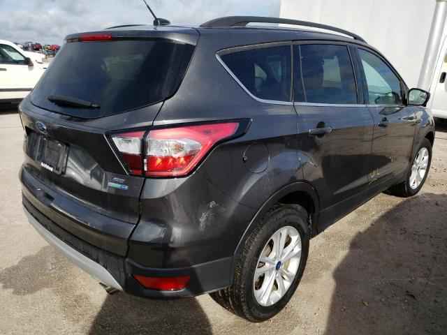 Photo 4 from auction – 2018 FORD ESCAPE SE with VIN 1FMCU9GDXJUA70173