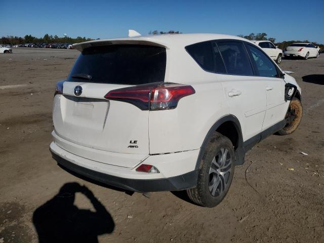 Photo 4 from auction – 2018 TOYOTA RAV4 LE with VIN 2T3BFREV6JW851586