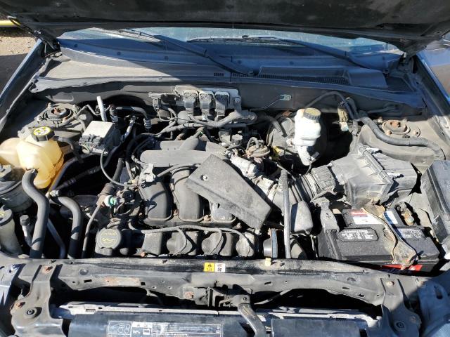 Photo 7 from auction – 2005 FORD ESCAPE LIM with VIN 1FMYU04125KA94027