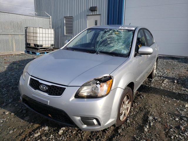 Photo 9 from auction – 2011 KIA RIO BASE with VIN KNADH4B35B6744943