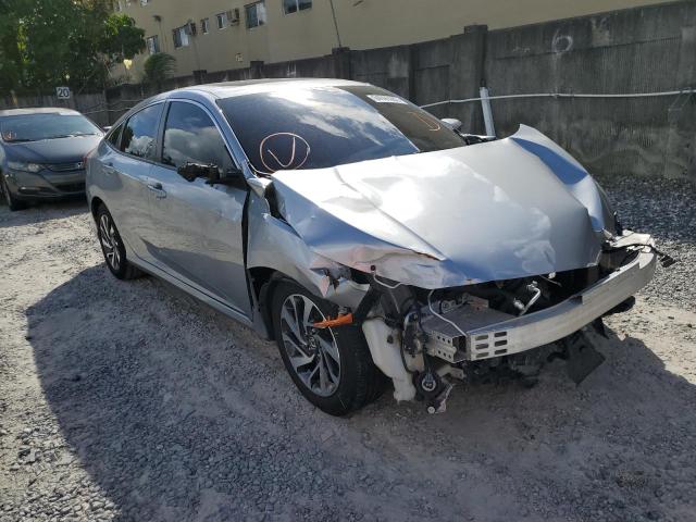 HONDA CIVIC EX 2018 with VIN 2HGFC2F77JH589645 - Photo from auction