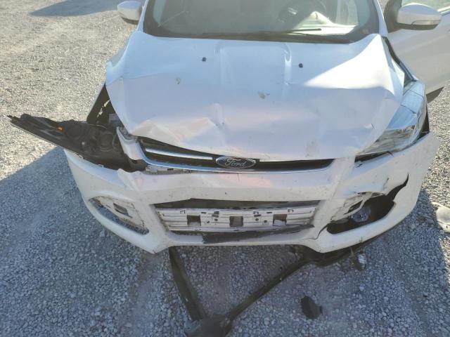 Photo 7 from auction – 2014 FORD ESCAPE TIT with VIN 1FMCU0J97EUA13385