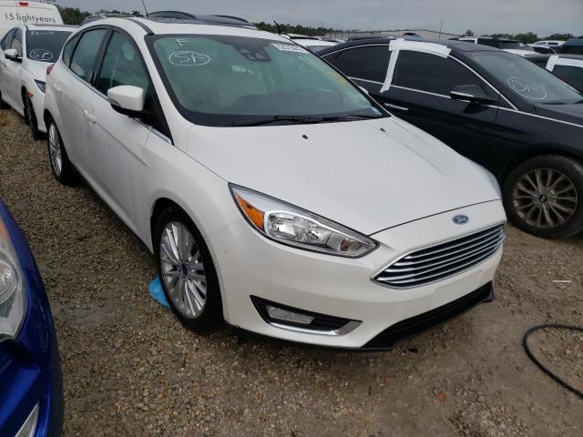 FORD FOCUS TITA 2015 with VIN 1FADP3N21FL215666 - Photo from auction