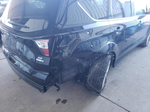 Photo 9 from auction – 2018 FORD ESCAPE SE with VIN 1FMCU9GD7JUA39138