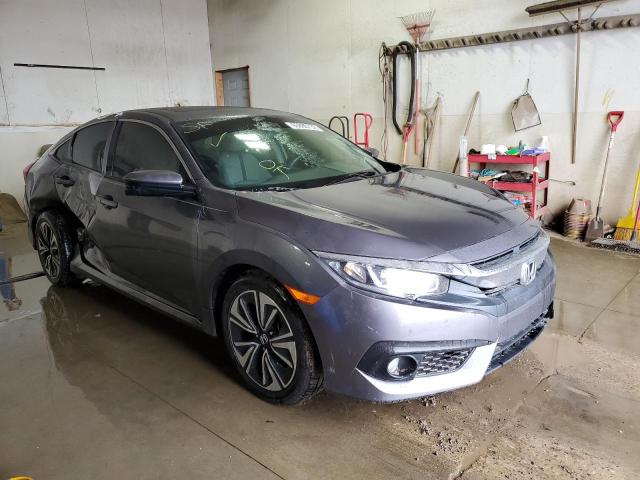 Photo 1 from auction – 2017 HONDA CIVIC EX with VIN 19XFC1F4XHE027677