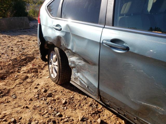 Photo 9 from auction – 2014 HONDA CR-V EX with VIN 2HKRM3H55EH515227
