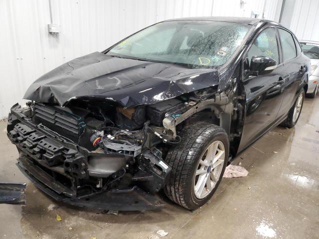 Photo 2 from auction – 2018 FORD FOCUS SE with VIN 1FADP3F23JL246716