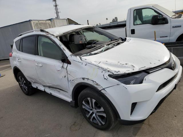 Photo 9 from auction – 2018 TOYOTA RAV4 LE with VIN JTMZFREV3JJ743780