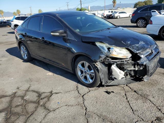 FORD FOCUS SE 2014 with VIN 1FADP3F23EL271217 - Photo from auction