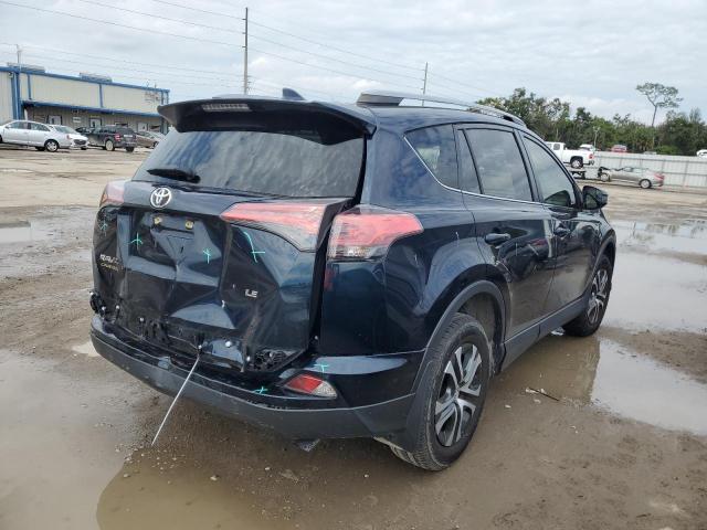 Photo 4 from auction – 2018 TOYOTA RAV4 LE with VIN JTMZFREV2JJ204020