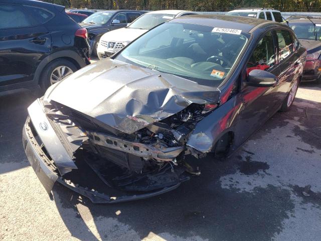 Photo 7 from auction – 2015 FORD FOCUS SE with VIN 1FADP3F24FL226613