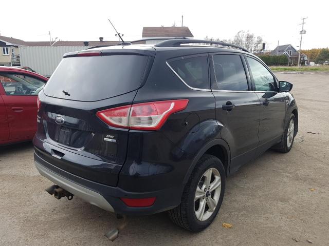 Photo 4 from auction – 2014 FORD ESCAPE SE with VIN 1FMCU9G90EUD46913
