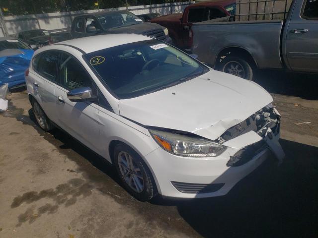 FORD FOCUS SE 2017 with VIN 1FADP3K26HL258701 - Photo from auction