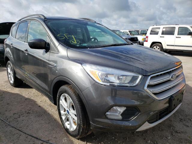 FORD ESCAPE SE 2018 with VIN 1FMCU9GDXJUA70173 - Photo from auction
