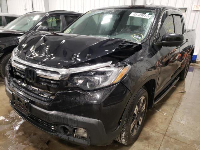 Photo 2 from auction – 2017 HONDA RIDGELINE with VIN 5FPYK3F63HB014943