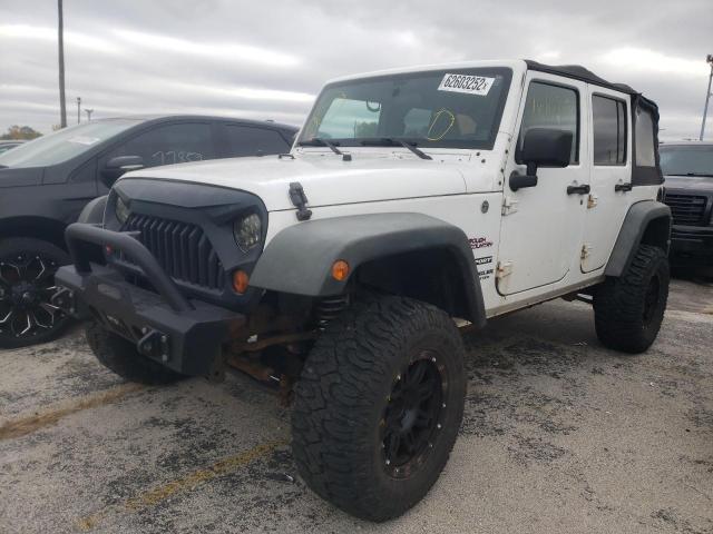 Photo 2 from auction – 2011 JEEP WRANGLER U with VIN 1J4BA3H16BL592066