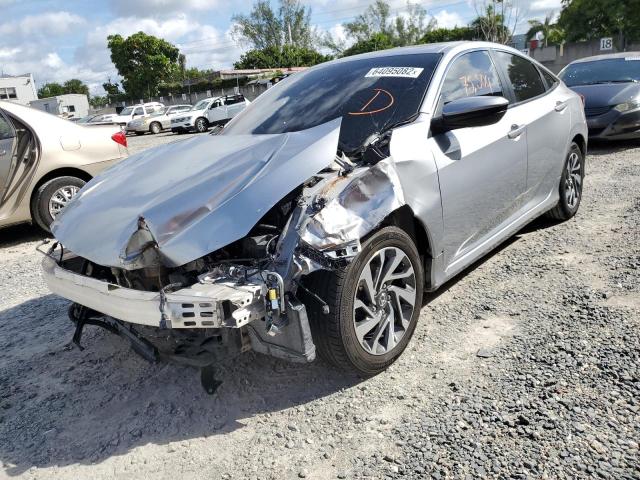 Photo 2 from auction – 2018 HONDA CIVIC EX with VIN 2HGFC2F77JH589645