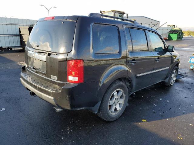 Photo 4 from auction – 2011 HONDA PILOT TOUR with VIN 5FNYF4H9XBB039324