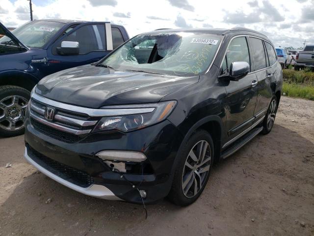 Photo 2 from auction – 2018 HONDA PILOT ELIT with VIN 5FNYF6H03JB007441