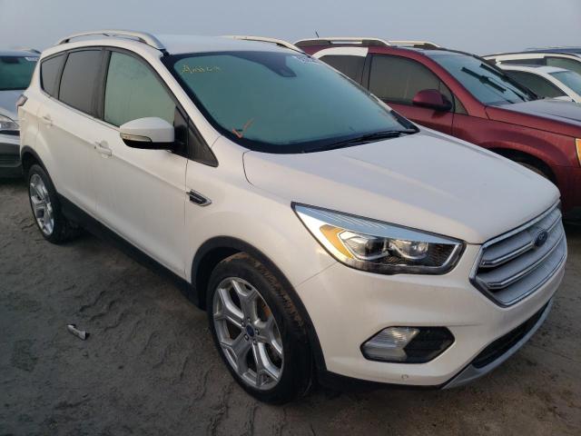 FORD ESCAPE TIT 2018 with VIN 1FMCU0J9XJUA48979 - Photo from auction