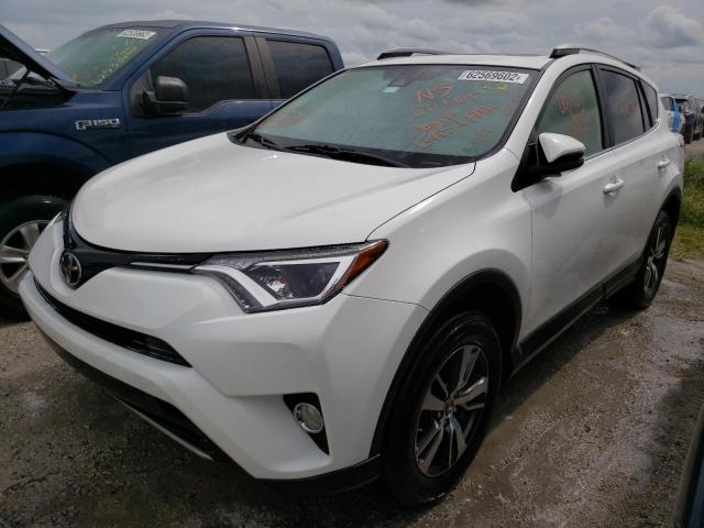 Photo 2 from auction – 2017 TOYOTA RAV4 XLE with VIN JTMWFREV1HJ123748