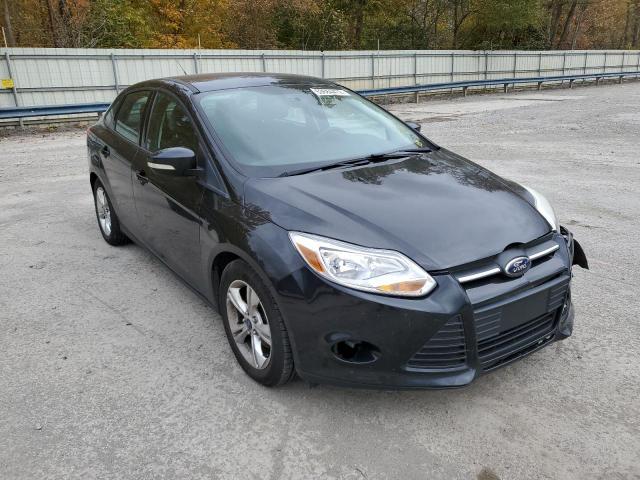 FORD FOCUS SE 2014 with VIN 1FADP3F21EL174095 - Photo from auction